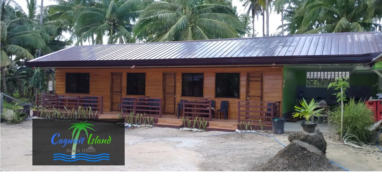 <b class="font-bara"><i class="bi bi-geo-fill h4"></i> CAGWAIT ISLAND BEACH HOUSE</b> <br/>Located at Purok 6, Poblacion, Cagwait Surigao del Sur | Contact No.: 0946- 730- 3800 | Facebook Page: https://www.facebook.com/cagwait.island